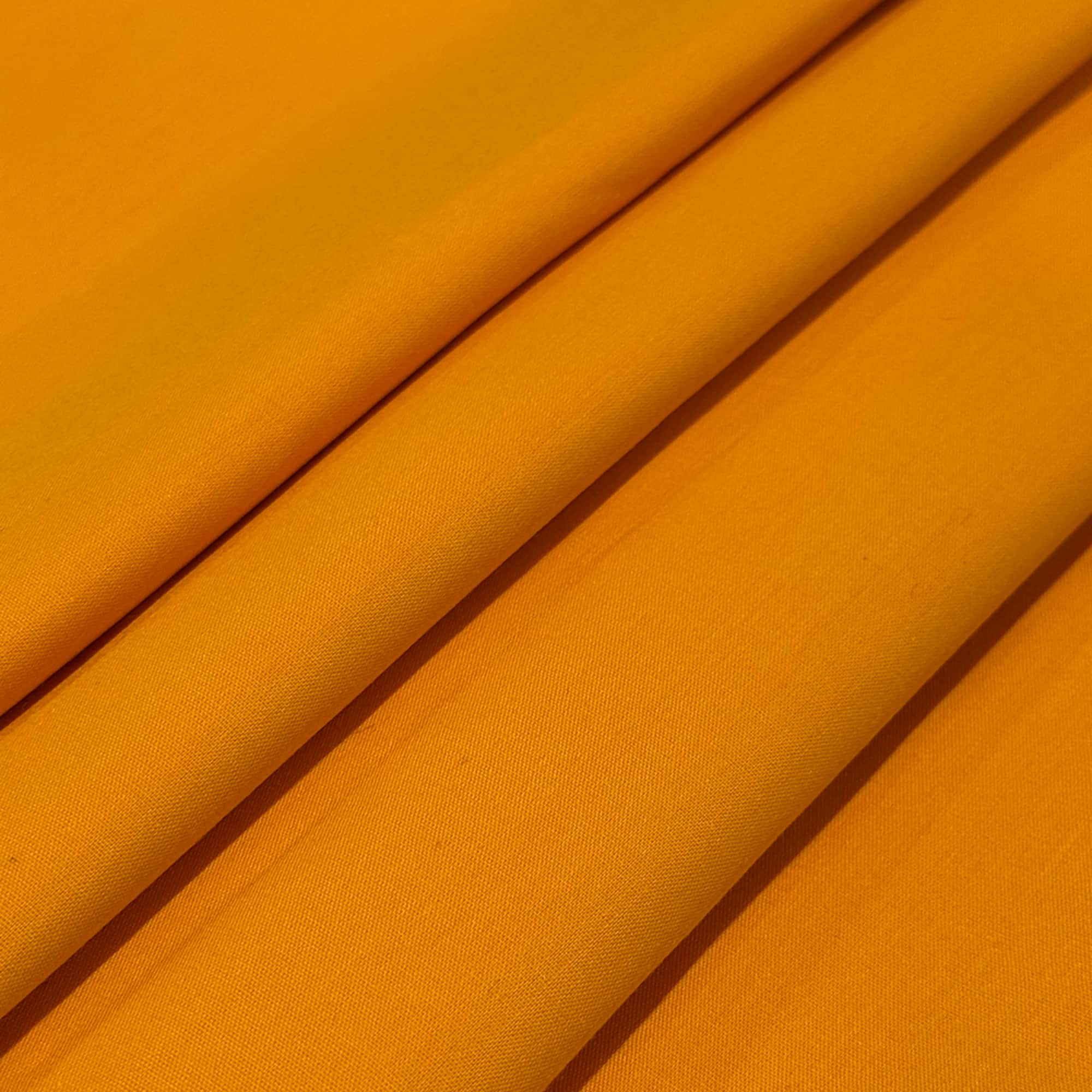 Feldman Solid Light Orange Quilting Broadcloth Fabric